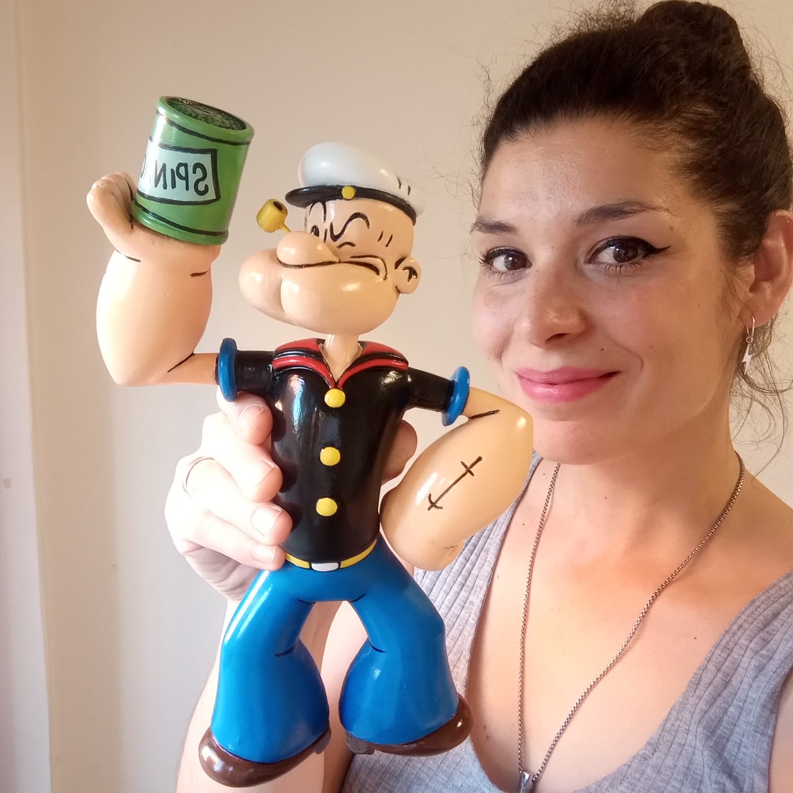 Vivian Coscia with one of her hand painted sculptures
